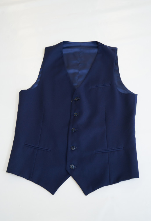 Gilet CHRIS bleu roi comportant une poche de poitrine et 5 boutons.