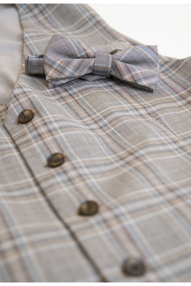 Gillet CHRISP carreaux beige comportant 5 boutons.