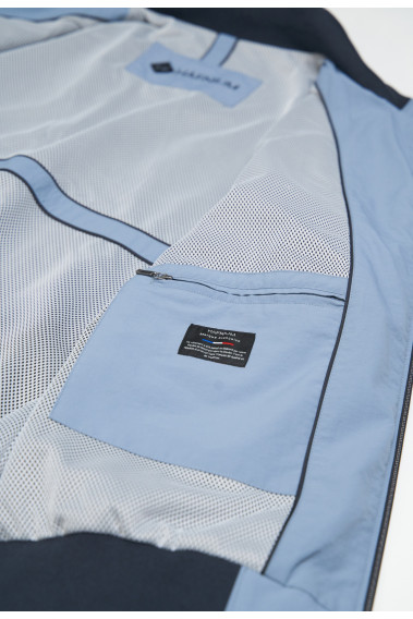 Zoom sur l'intérieur du blouson JUMBO bleu clair. Il comporte 2 poches poitrine intérieures.