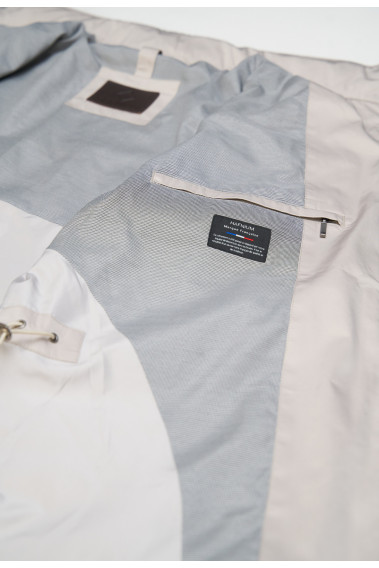 Zoom sur l'intérieur de la parka KALEO beige. Elle comporte 2 poches intérieures.