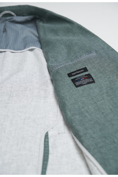 Zoom sur l'intérieur de la veste SAFARY verte. Elle comporte 2 poches intérieures.