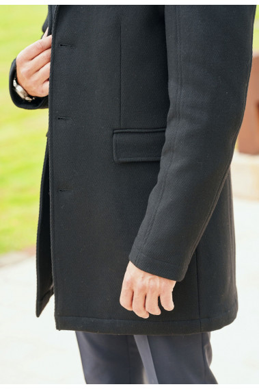 Zoom sur le bas du  manteau EIFFEL noir.