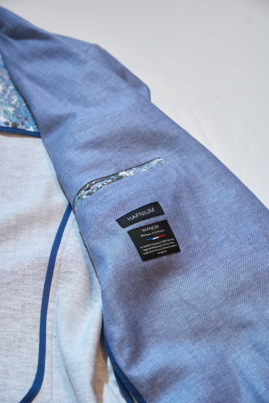 Zoom sur l'intérieur de la veste TROPICALW bleue. Elle comporte 2 poches intérieures.